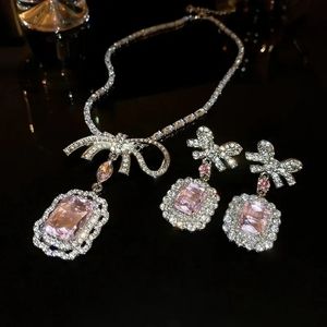 Two pieces silver and pink jewelry set